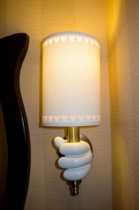 Mickey Mouse's Gloved Hands Holding the Light at the Disneyland Hotel