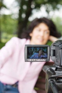 Video camera and woman